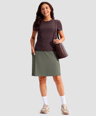 women's 4 pockets knee length golf skort in grey sage - front view