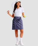 women's 4 pockets knee length golf skort in navy circle - side view