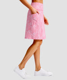 women's 4 pockets knee length golf skort in pink paisley - back view