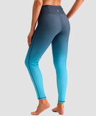 women's UV protection zipper pocket lined leggings in gradient gray cyan - back view