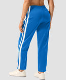 women's contrast stripe zip pockets track pants 28'' in lake blue - back view