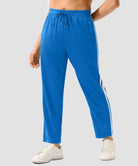 women's contrast stripe zip pockets track pants 28'' in lake blue - side view