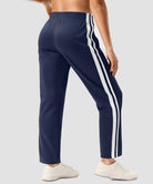 women's contrast stripe zip pockets track pants 28'' in navy - back view
