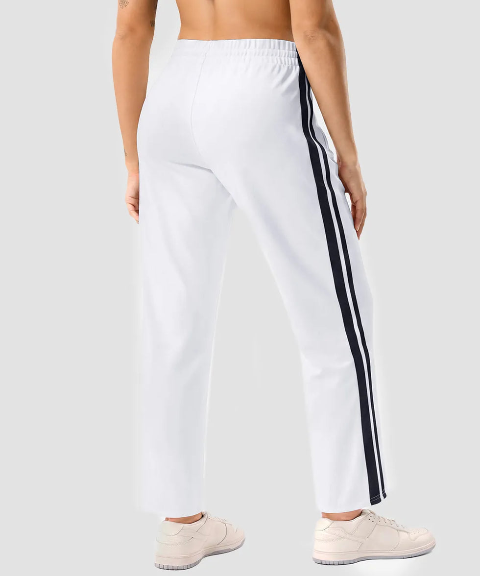 women's contrast stripe zip pockets track pants 28'' in white - back view