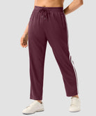 women's contrast stripe zip pockets track pants 28'' in wine - front view