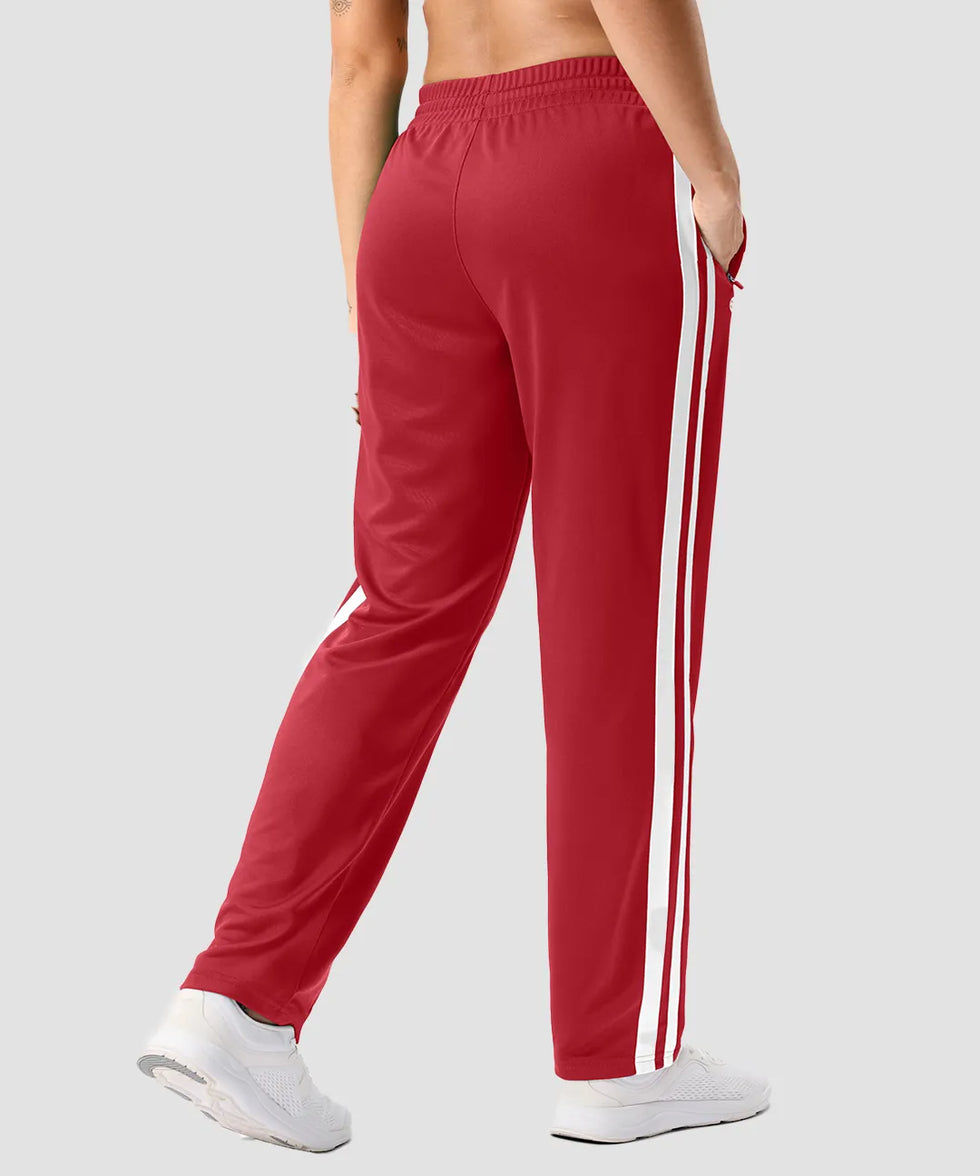 women's contrast stripe zip pockets track pants 30''/32'' in dark red - back view