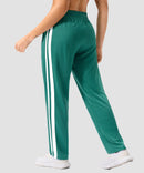 women's contrast stripe zip pockets track pants 30''/32'' in forest green - back view