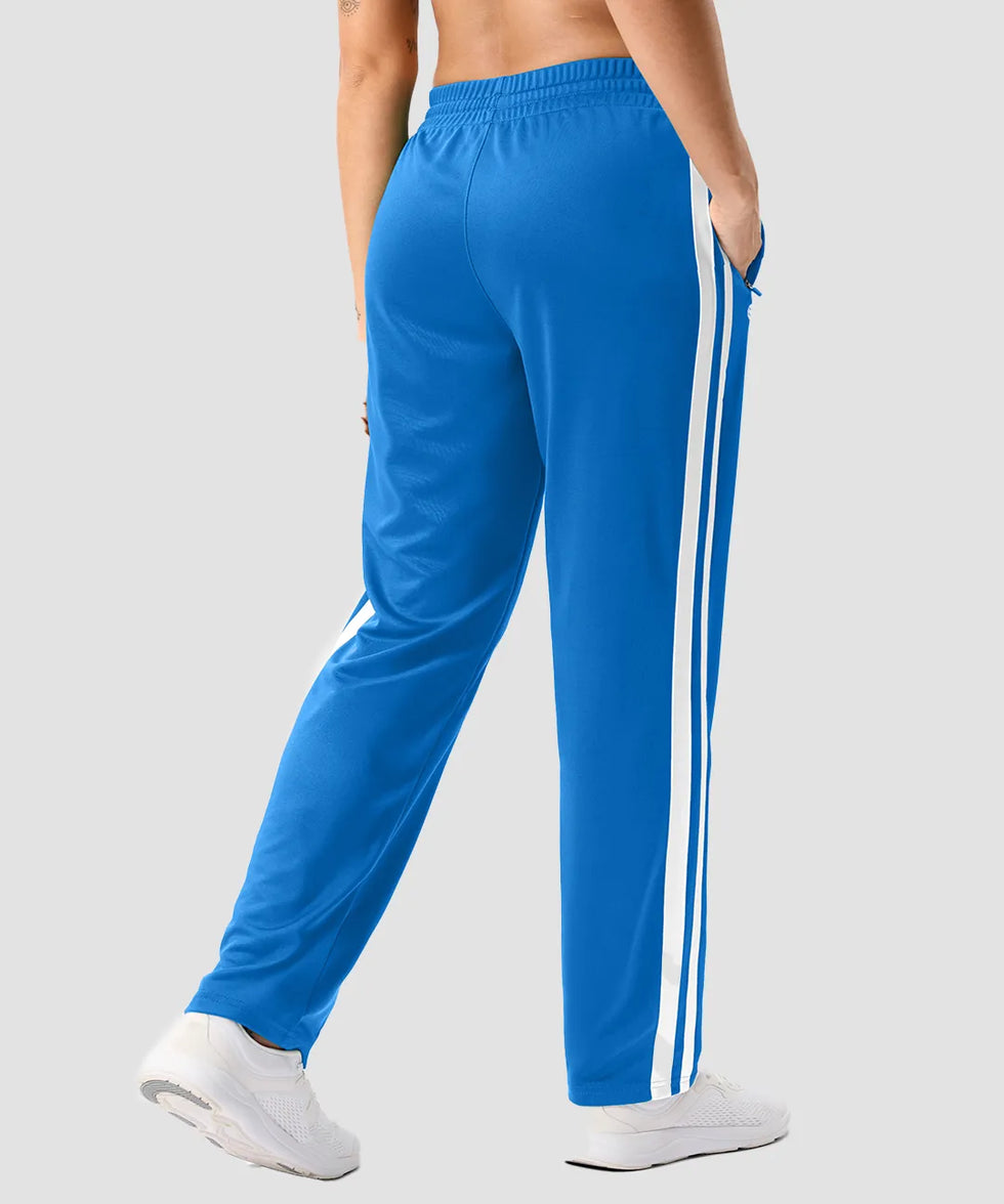 women's contrast stripe zip pockets track pants 30''/32'' in lake blue - back view