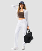 women's contrast stripe zip pockets track pants 30''/32'' in white - matching outfits view