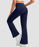 women's crossover thermal flare leggings in navy- back view