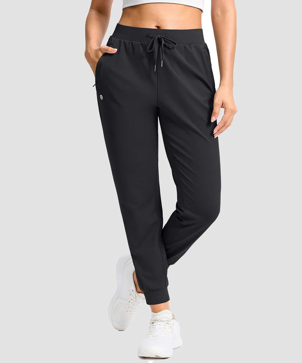 women's drawstring mid waist joggers in black - back view