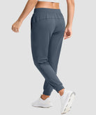 women's drawstring mid waist joggers in dusty blue - back view