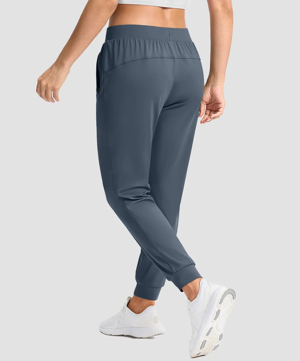 women's drawstring mid waist joggers in dusty blue - back view
