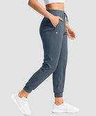 women's drawstring mid waist joggers in dusty blue - side view