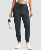 women's drawstring mid waist joggers in gray - front view