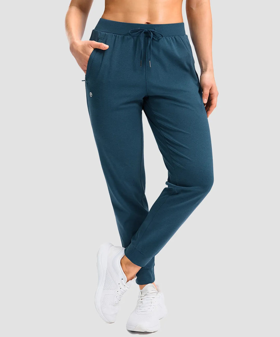 women's drawstring mid waist joggers in heather dark blue - front view