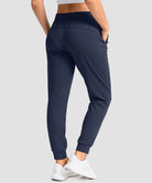 women's drawstring mid waist joggers in navy - back view