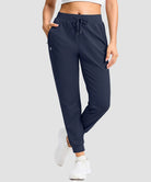 women's drawstring mid waist joggers in navy - pocket detail