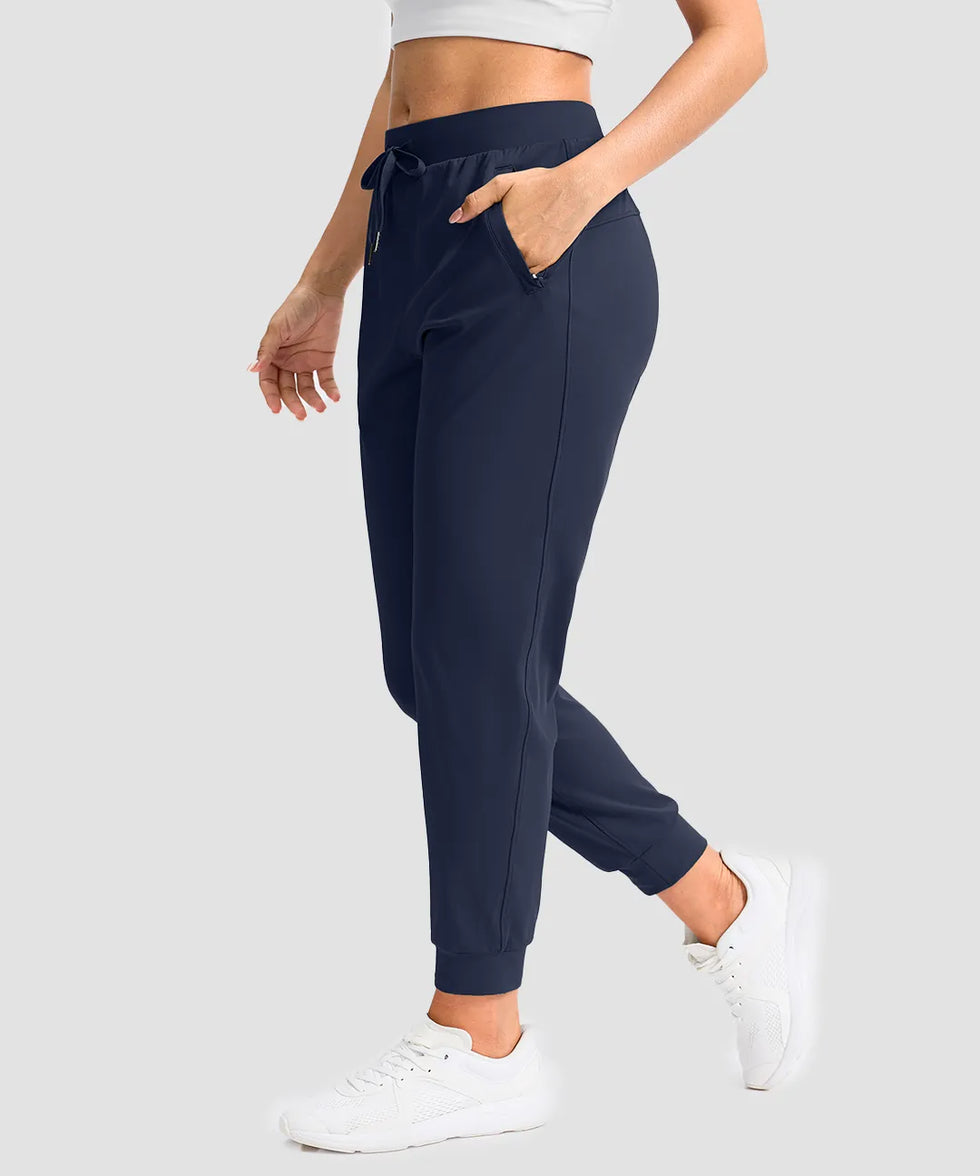 women's drawstring mid waist joggers in navy - side view