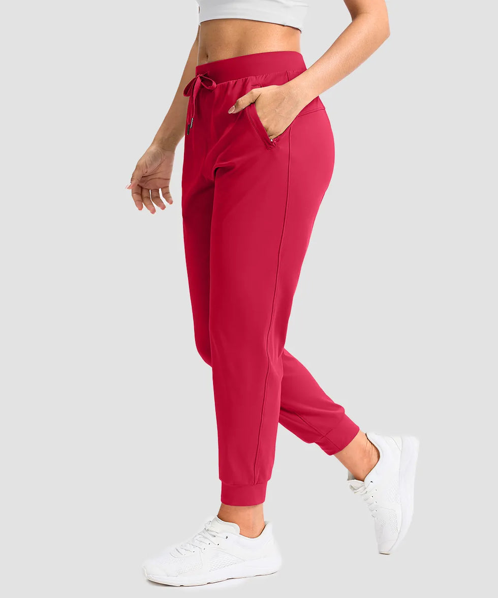 women's drawstring mid waist joggers in red - pocket detail