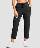 women's drawstring with pockets ankle pants in black - front view