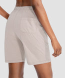 women's drawstring with pockets shorts 7'' in oatmeal - back view