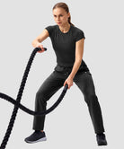women's elastic waist 2 zip pockets track pants in black - matching outfits view