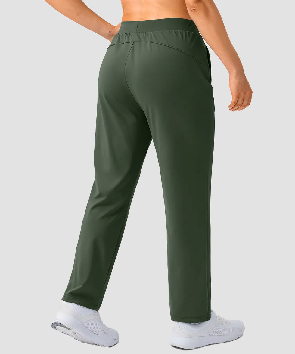 women's elastic waist 2 zip pockets track pants in olive green - back view