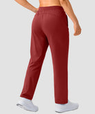women's elastic waist 2 zip pockets track pants in savannah red - back view