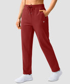 women's elastic waist 2 zip pockets track pants in savannah red - side view