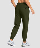 women's fleece-lined four-zip-pocket outdoor pants in olive green - back view