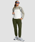 women's fleece-lined four-zip-pocket outdoor pants in olive green - front view