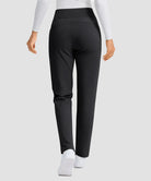women's fleece-lined slim-fit golf pants in black - back view