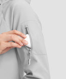 women's fleece-lined softshell jacket in grayish white - zipper pocket detail view