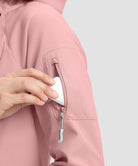 women's fleece-lined softshell jacket in pink - zipper pocket detail view
