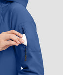 women's fleece-lined softshell jacket in royal blue - zipper pocket detail view