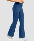 women's fleece lining zip pockets flare leggings in blue - zipper pocket detail view