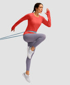 women's fleece zipper pockets base layer in coral - front view