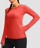 women's fleece zipper pockets base layer in coral - zipper pocket detail view