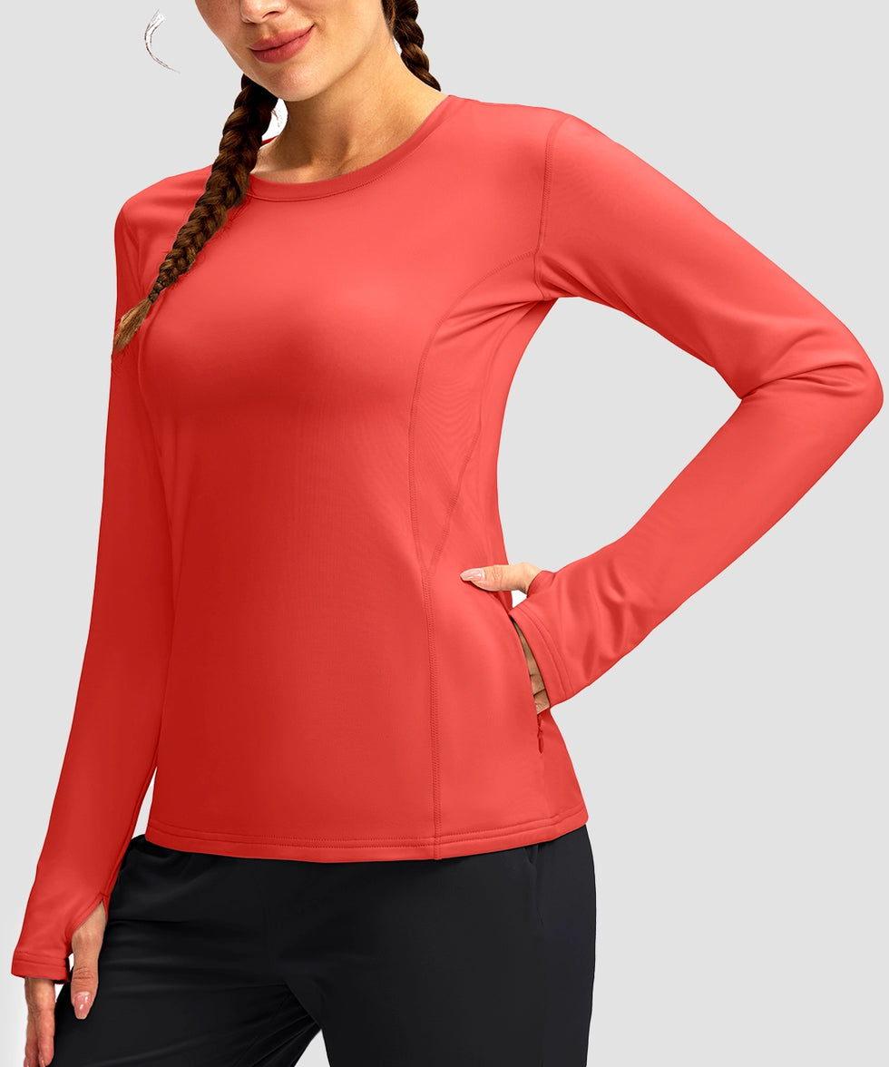 women's fleece zipper pockets base layer in coral - zipper pocket detail view