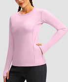 women's fleece zipper pockets base layer in light pink - zipper pocket detail view