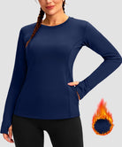 women's fleece zipper pockets base layer in navy - zipper pocket detail view