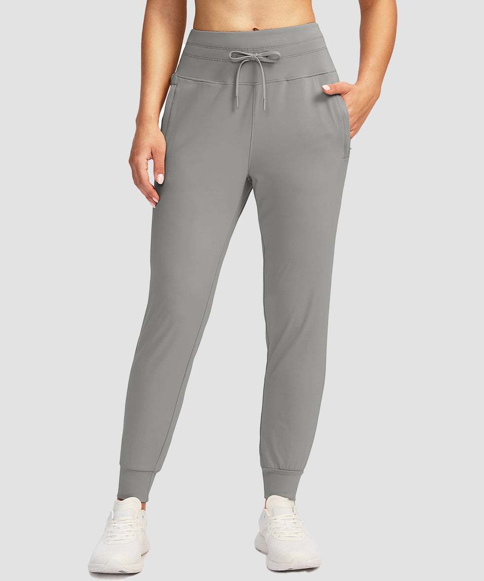 women's high-rise stretchy athletic joggers in light gray - front view