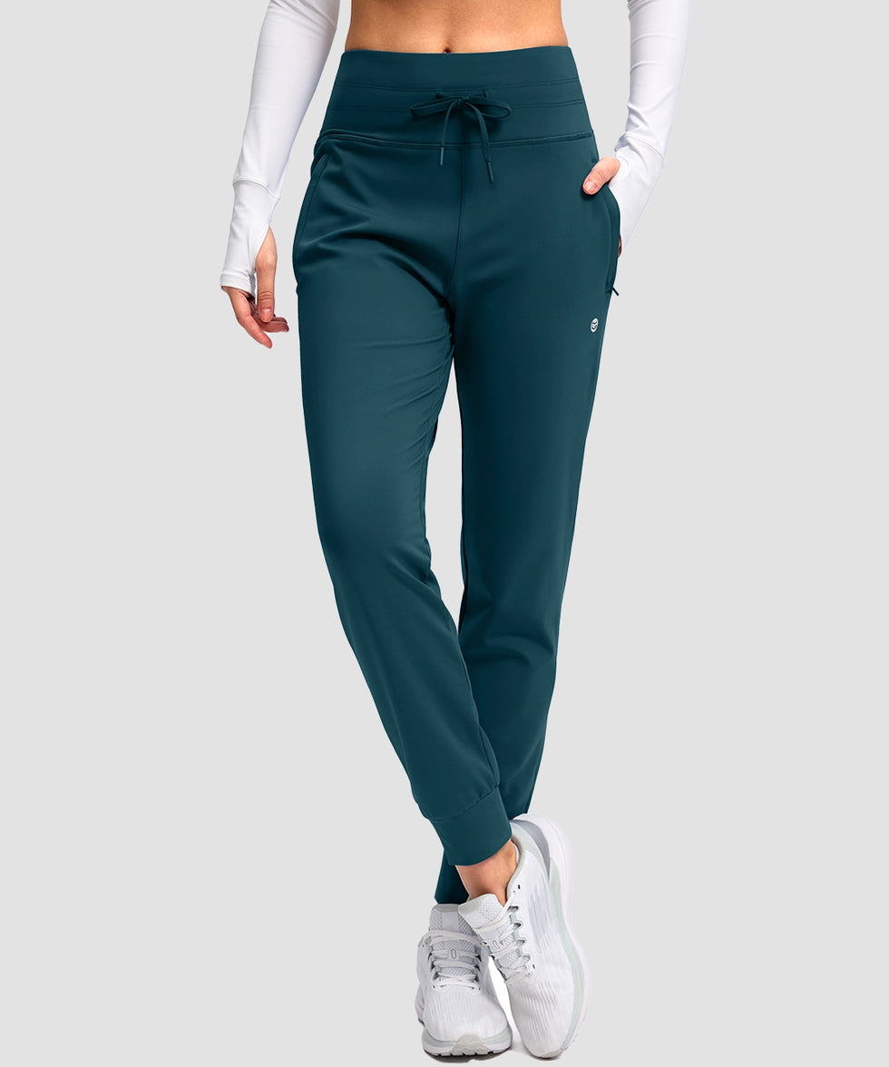 women's high rise fleece-lined joggers in dark blue - front view