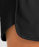 women's high rise slit with pockets shorts 3'' in black - hem detail view