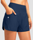 women's high rise slit with pockets shorts 3'' in dark blue - pocket detail view
