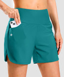 women's high rise slit with pockets shorts 5'' in aqua blue - pocket detail view
