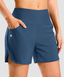women's high rise slit with pockets shorts 5'' in dark blue - front view