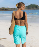 women's high waist lined swim shorts 9' in cyan - pose detail view-3