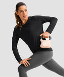 women's hip-length workout long sleeve in black - fabric detail view